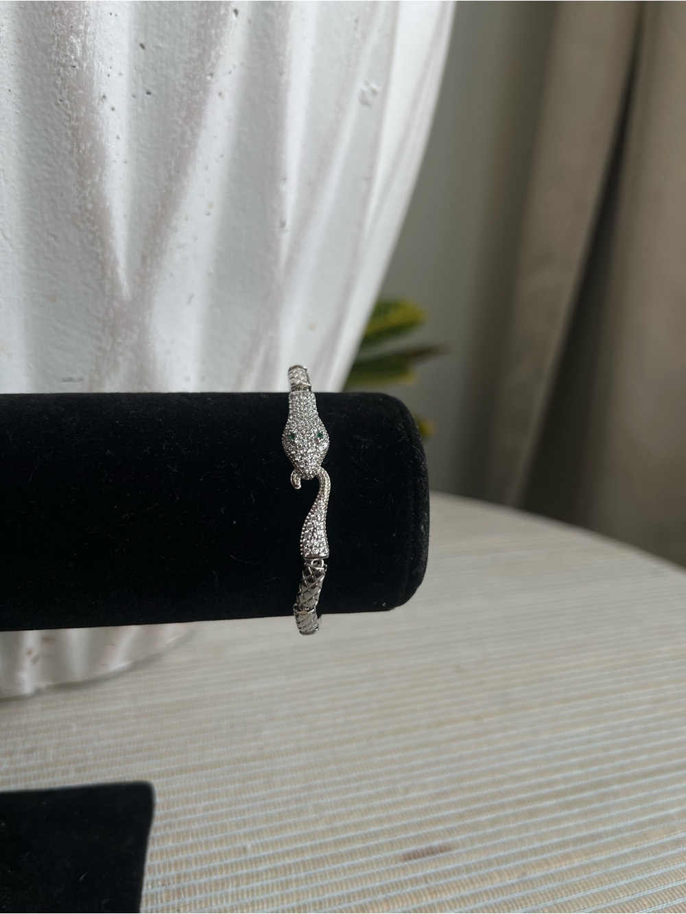 Silver snake with green eyes bracelet